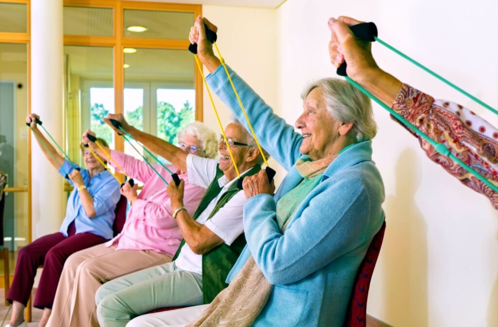 seniors are doing posture exercises sitting on a chair